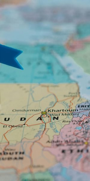 Detailed close-up map of Africa featuring Sudan and nearby countries marked with flags.